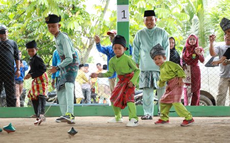 Wabup Siak Husni Merza Buka Festival Gasing Berembang Kampung Rawang Kao Barat