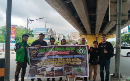 Komunitas Driver Online Pekanbaru dan Polda Riau Bersatu untuk Bantu Korban Banjir di Rumbai